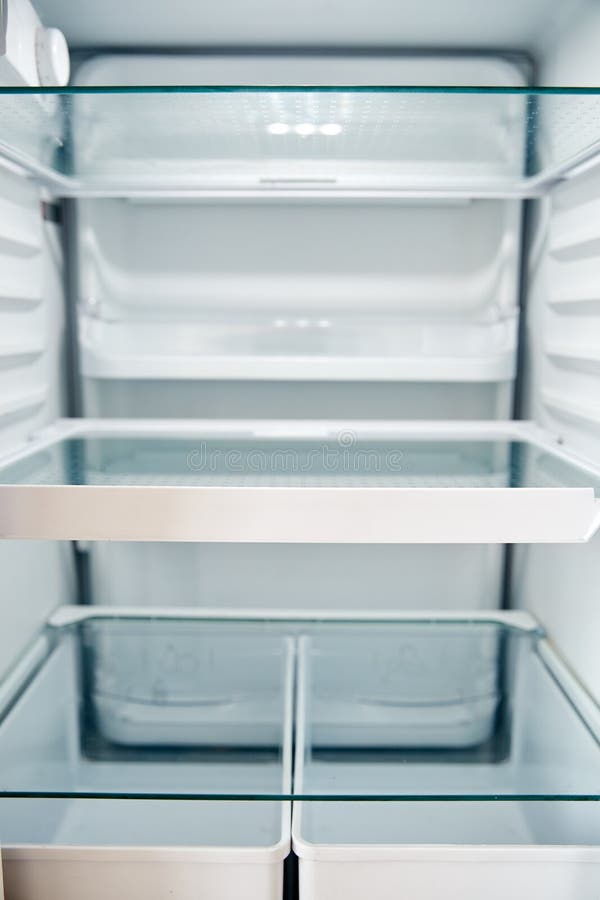 View Looking Inside Empty Refrigerator With Closed Door royalty free stock photos